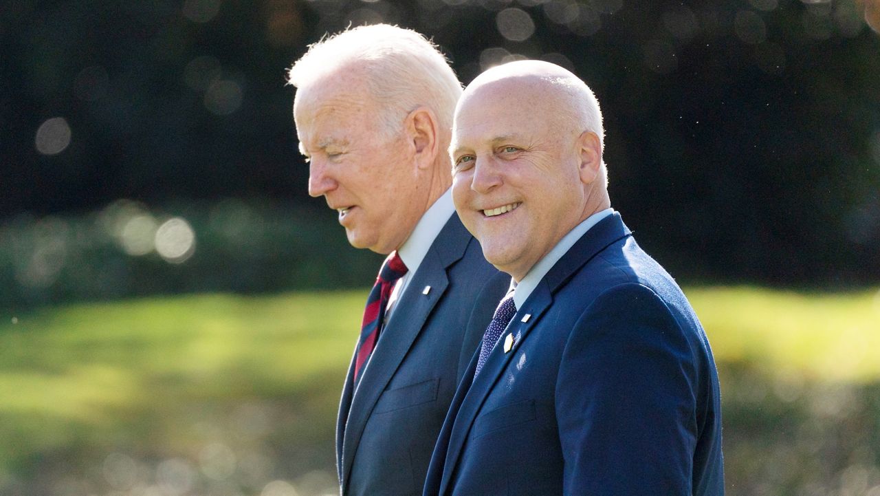 President Joe Biden and former New Orleans Mayor Mitch Landrieu walk to board Marine One on the South Lawn of the White House in Washington, Tuesday, Nov., 16 2021, for the short flight to Andrews Air Force Base, Md., en route to Woodstock, N.H. (AP Photo/Carolyn Kaster)