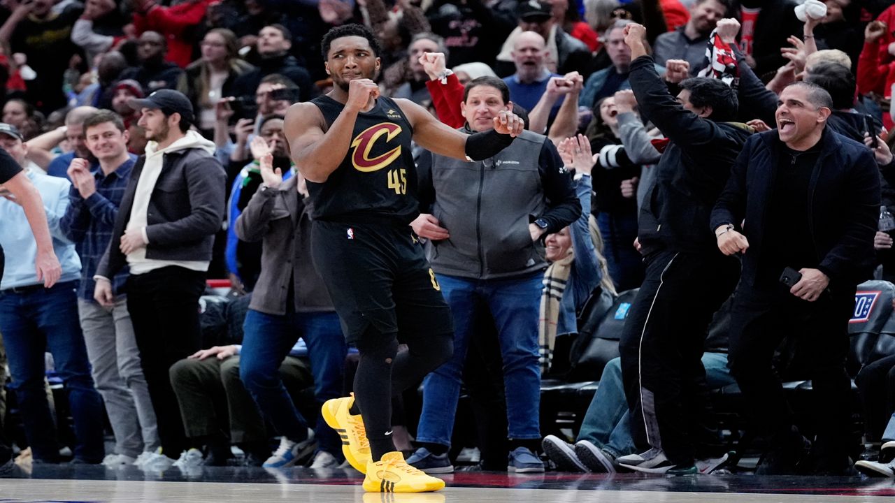 Cleveland Cavaliers guard Donovan Mitchell reacts after missing a basket during the first overtime of an NBA basketball game against the Chicago Bulls in Chicago, Wednesday, Feb. 28, 2024. The Bulls won 132-123 in double overtime. (AP Photo/Nam Y. Huh)