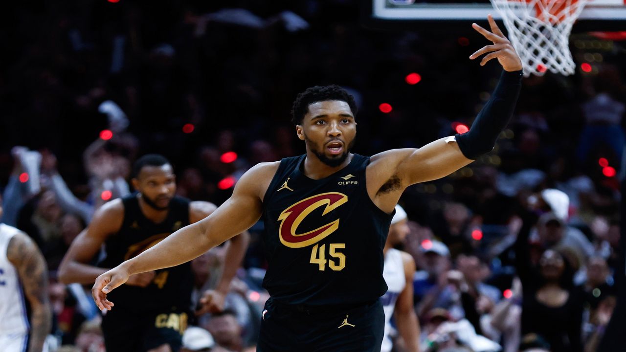 Cleveland Cavaliers guard Donovan Mitchell celebrates after making a three point basket against the Orlando Magic during the second half of Game 5 of an NBA basketball first-round playoff series, Tuesday, April 30, 2024, in Cleveland.