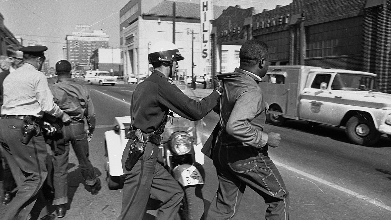 Rev. Martin Luther King, Jr. (left) and Rev. Ralph Abernathy (right) are arrested on April 12, 1963 following a civil rights demonstration in Birmingham, Ala., April 12, 1963. (Horace Cort/AP)