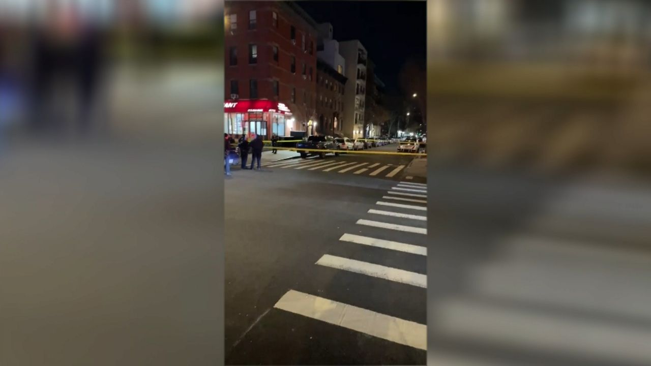 Shot in the chest while walking down the street in Harlem