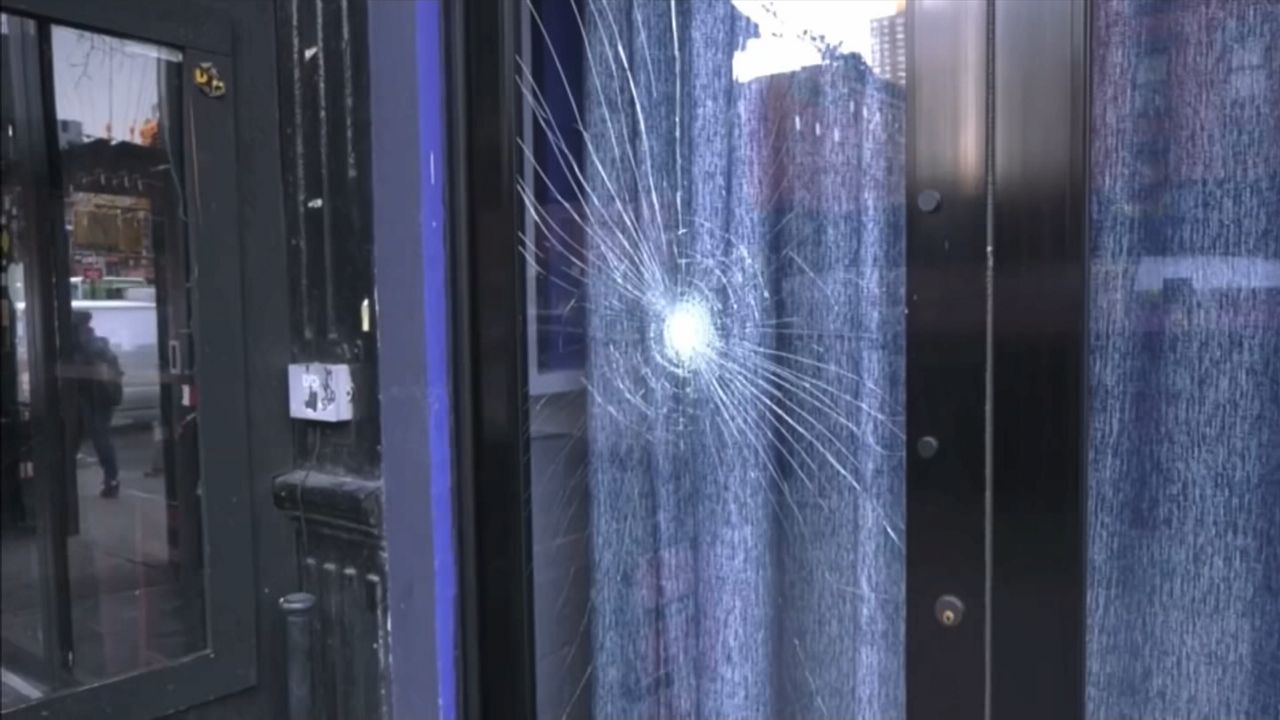 A man threw a brick at the window of VERS, a gay bar in Manhattan, Saturday night, vandalizing the building. It was the third time in one week the man has targeted the establishment. A suspect was arrested Tuesday afternoon. (NY1 Photo)