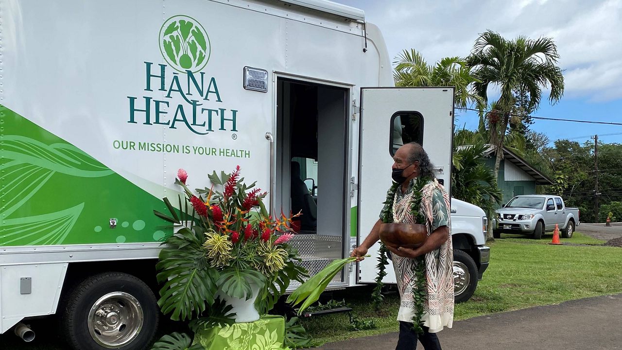 Kahu Lyons Naone blesses the mobile clinic. (Courtesy: Hana Health)