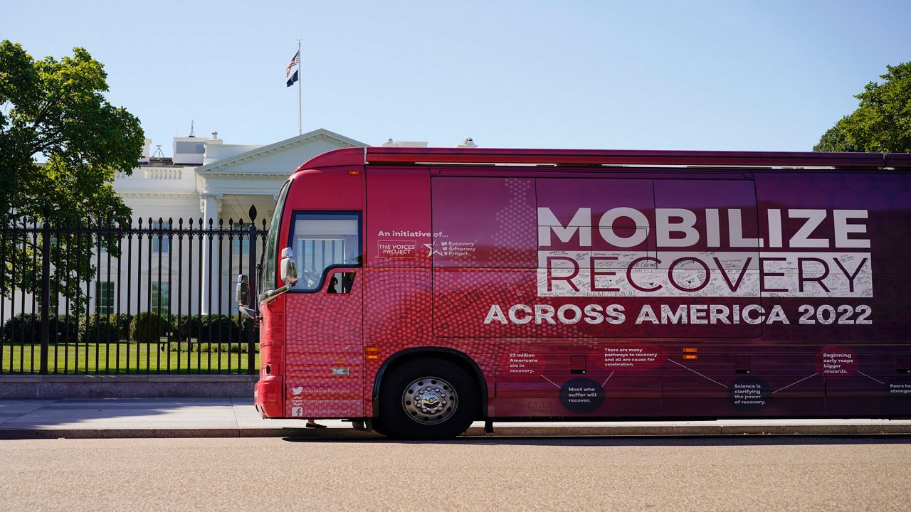 The Mobilize Recovery bus is parked on Pennsylvania Avenue in front of the White House in Washington, Friday, Sept. 23, 2022. (AP Photo/Carolyn Kaster)