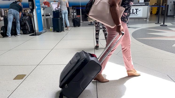 Monique Miles is a frequent traveler. 