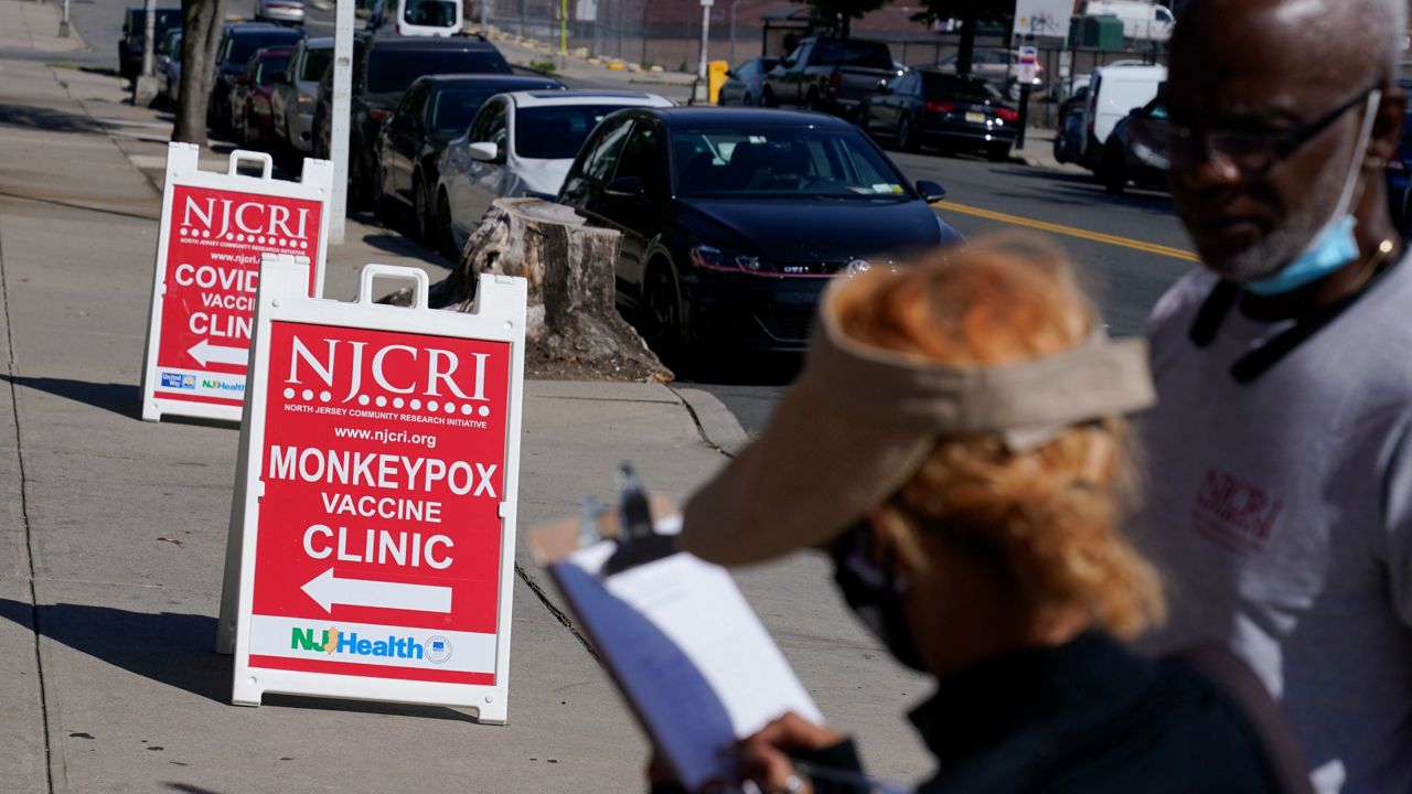 People line up to receive the monkeypox vaccine at a walk-in clinic at the North Jersey Community Research Initiative in Newark, N.J., on Aug. 16. (AP Photo/Seth Wenig, File) 