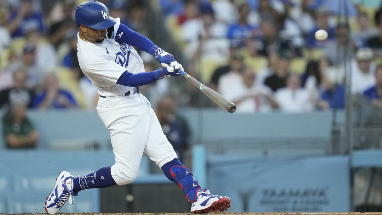 Betts hits two of Dodgers' five homers and drives in four runs in