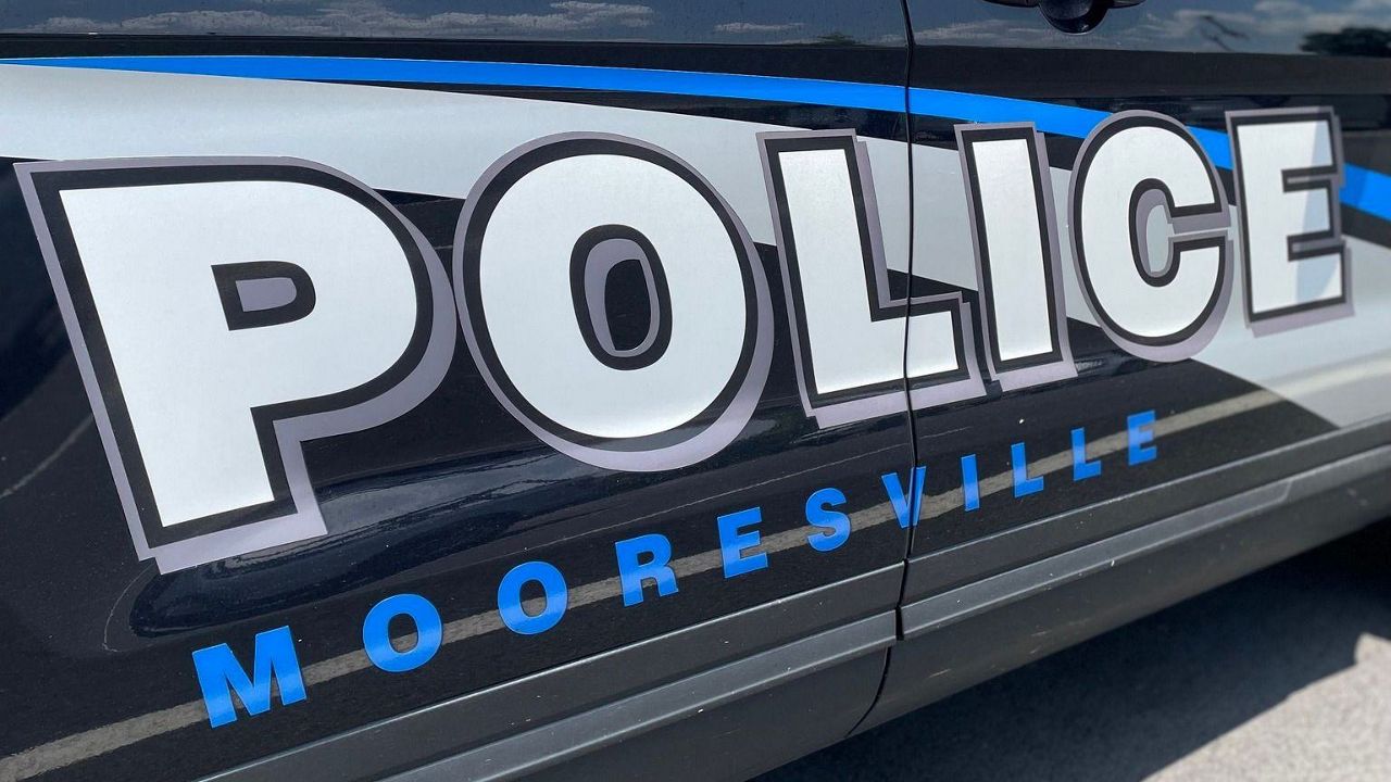 A Mooresville, North Carolina, police officer was arrested Wednesday and charged with four counts of sexual exploitation of a minor.