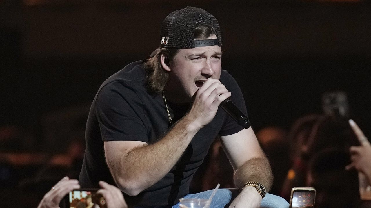 Morgan Wallen performs on the first night of the 2022 iHeartRadio Music Festival in Las Vegas on Sept. 23, 2022. Wallen's "Last Night" is one of AP's contenders for song of the summer. (AP Photo/John Locher, File)