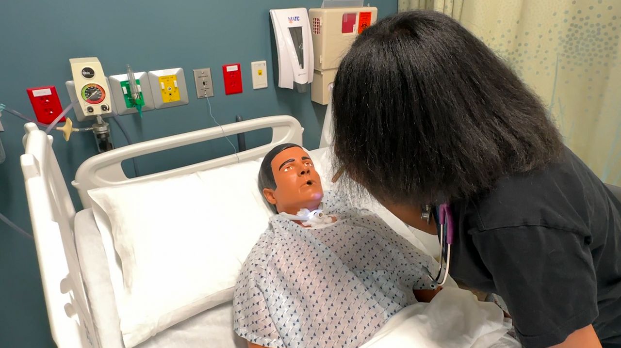 High school students work to LPNs