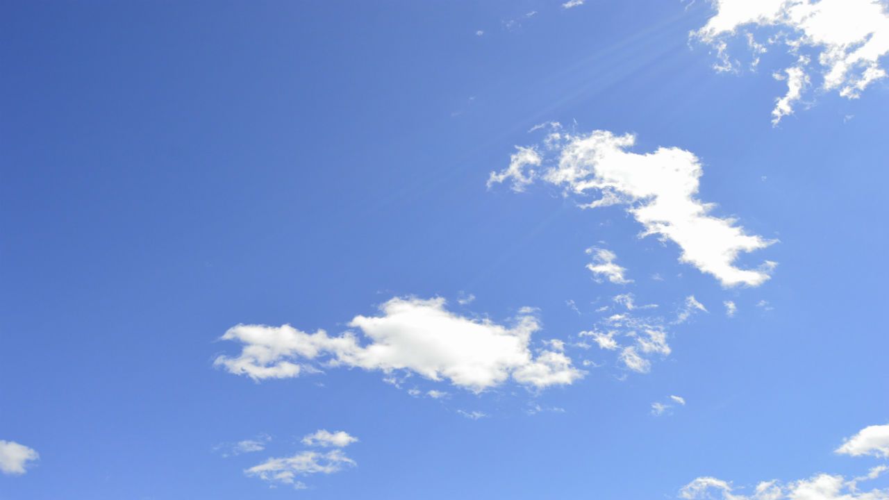 Cold front moves east tonight, sunny on Monday