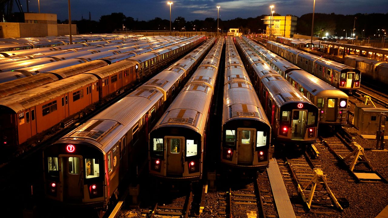 Trains from New York City's No. 7 subway line sit in a train yard in the borough of Queens in New York.