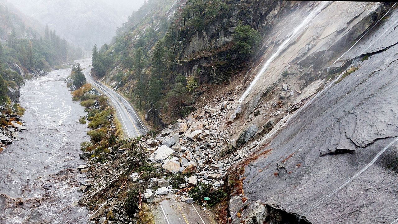 Rocks and vegetation cover Highway 70 following a landslide in the Dixie Fire zone on Oct. 24, 2021, in Plumas County, Calif. (AP Photo/Noah Berger, File)