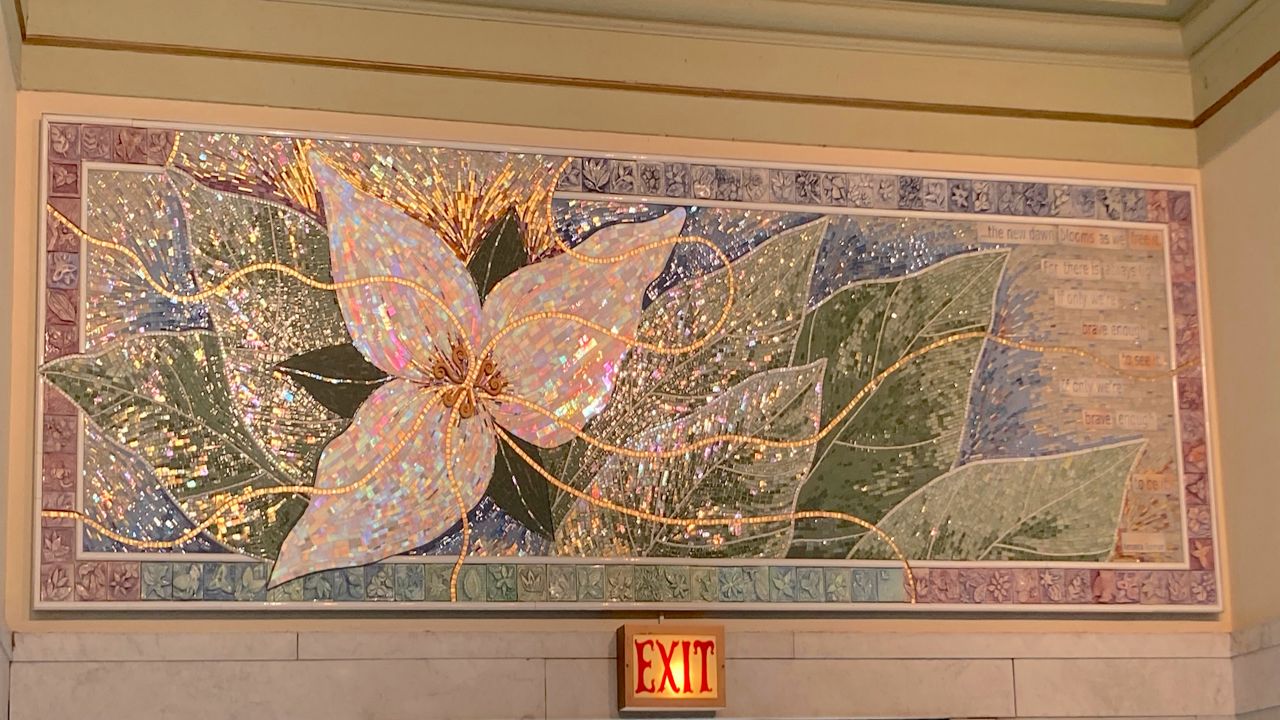 Local ceramics artist Bonnie Cohen created the mosaic with help from student artists of Akron Public Schools. (Photo courtesy of Curated Courthouse)