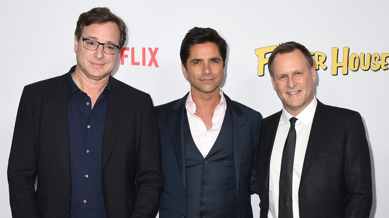 Bob Saget, John Stamos, and Dave Coulier at the premiere of "Fuller House" on Tuesday, Feb. 16, 2016 in Los Angeles. (Jordan Strauss/Invision/AP)
