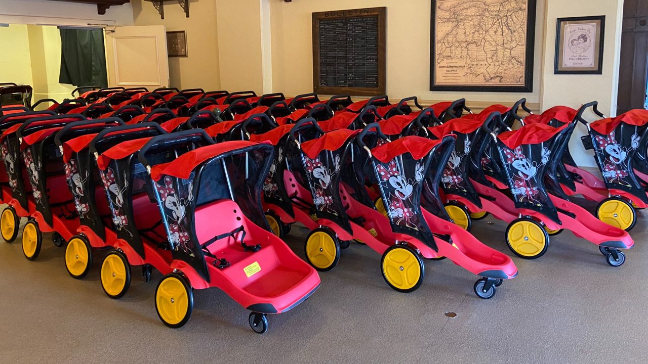 The new strollers available to rent at Disney World are red and yellow and feature Mickey and Minnie. (Photo courtesy: Disney)