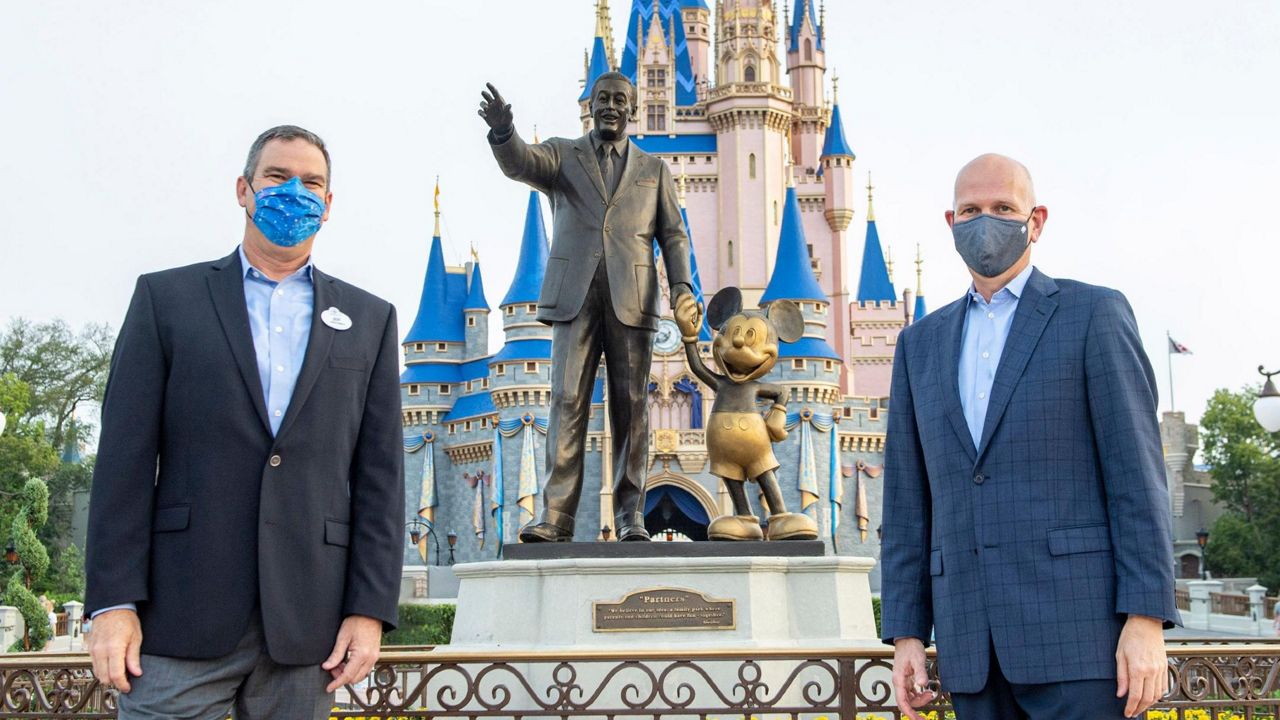 Walt Disney World president Jeff Vahle, left, with Randy Heffner, president and CEO of AdventHealth's Central Florida Division. (Disney/AdventHealth)