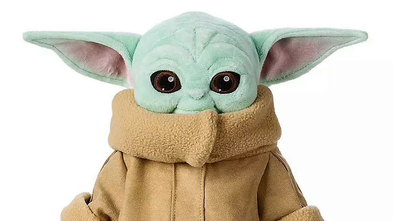 A plush toy version of The Child, aka Baby Yoda, from Disney's The Man...