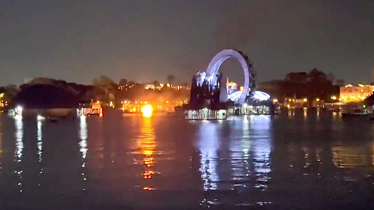 A fireworks platform at EPCOT caught fire Friday night after a performance of "Harmonious." (Photo: @The_Woulfe21/Twitter)