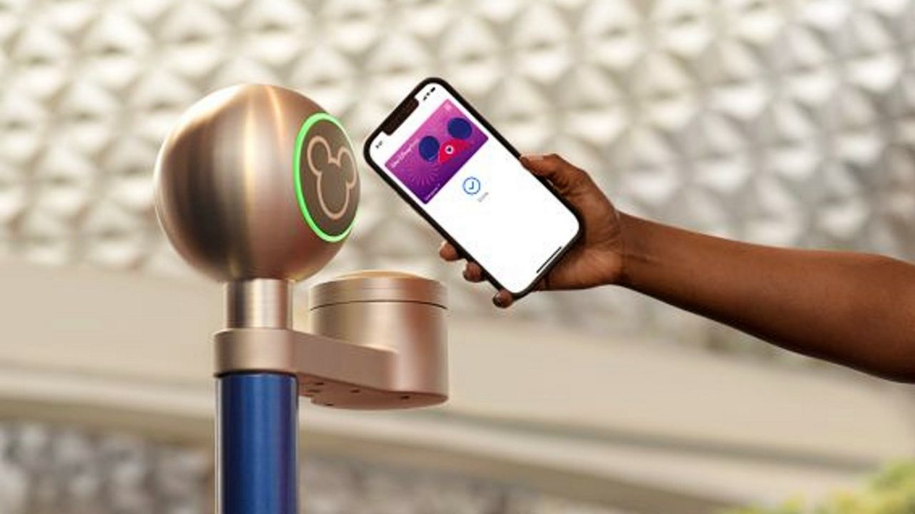Disney MagicMobile, a service that gives visitors access to MagicBand features through their mobile devices, will launch later this year. (Courtesy of Disney)