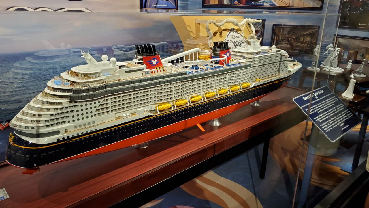 A model of the Disney Wish cruise ship is on display at the One Man's Dream attraction at Disney's Hollywood Studios. (Spectrum News/Ashley Carter)