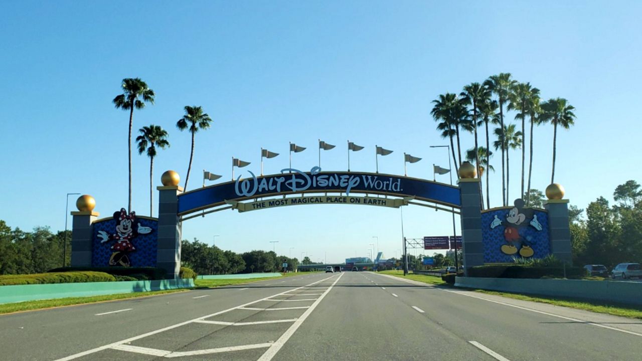 The entrance archway to Disney World is decorated for the resort's 50th anniversary celebration. (Spectrum News/Ashley Carter)