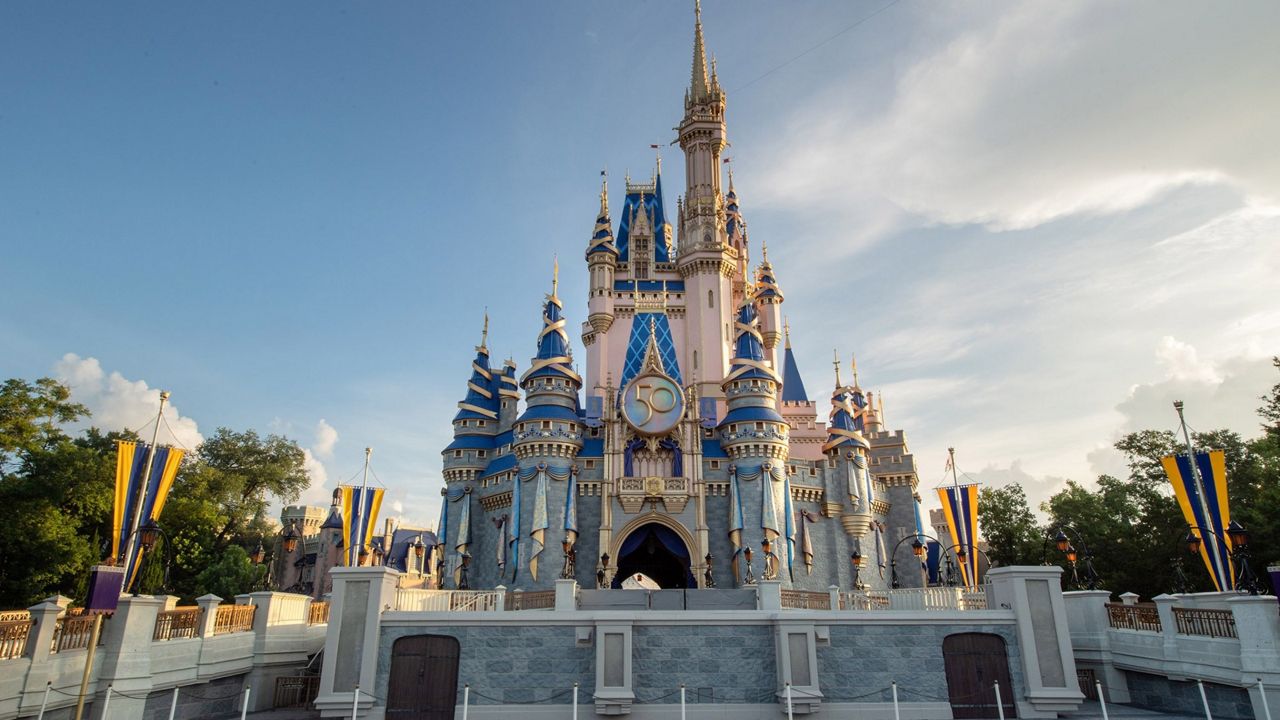 A golden crest has been installed on Cindrella Castle at Magic Kingdom for Disney World's 50th anniversary celebration. (Disney)