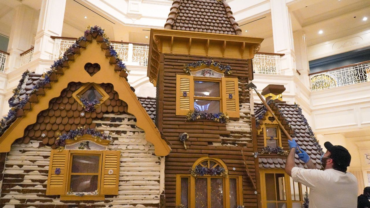 Disney World feeds its gingerbread house to the bees