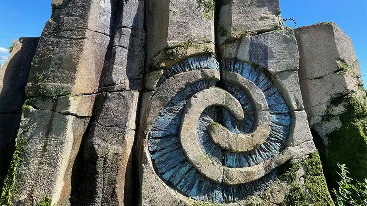 Rockwork in Journey of Water which features the spiral symbol from "Moana." (Photo: Disney) 