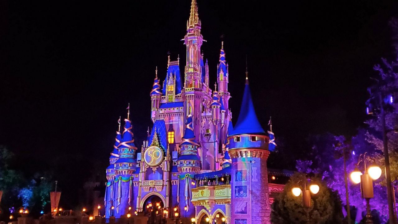 Cinderella Castle at Magic Kingdom decorated for Disney World's 50th anniversary celebration. (Spectrum News/Ashley Carter)