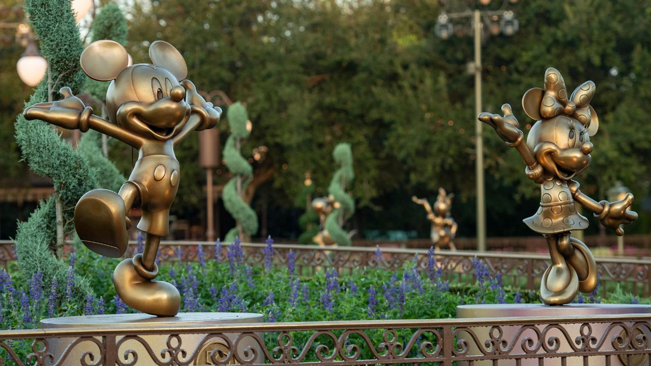 Mickey and Minnie Mouse character statues at Magic Kingdom for Disney World's 50th anniversary celebration, which begins Oct. 1. (Disney/David Roark)