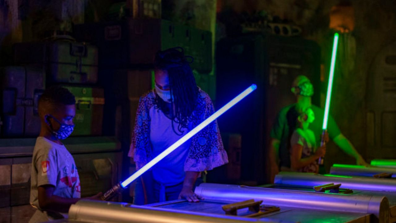 Visitors to Star Wars: Galaxy's Edge at Disney's Hollywood Studios can build their own lightsabers at Savi's Workshop. (Matt Stroshane/Disney)