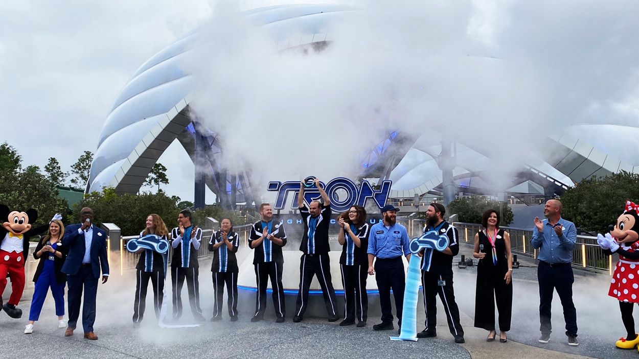 Disney cast members celebrate opening of TRON