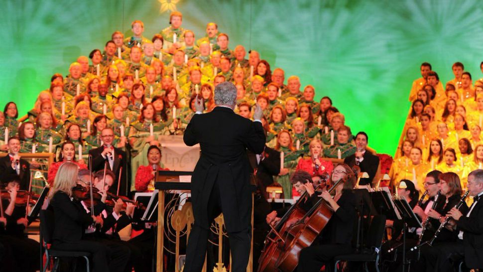 The Candlelight Processional at Epcot features a live orchestra, mass choir and a celebrity narrator. (Courtesy of Disney Parks)