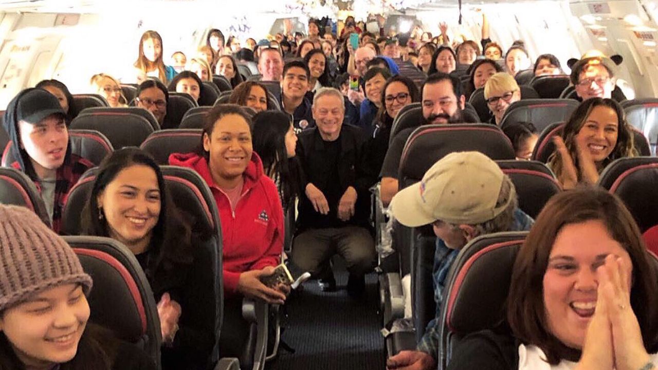 Families of fallen soldiers on plane heading to Disney World as part of the Gary Sinise Foundation's Snowball Express (Photo Courtesy: @GarySinise/Twitter)