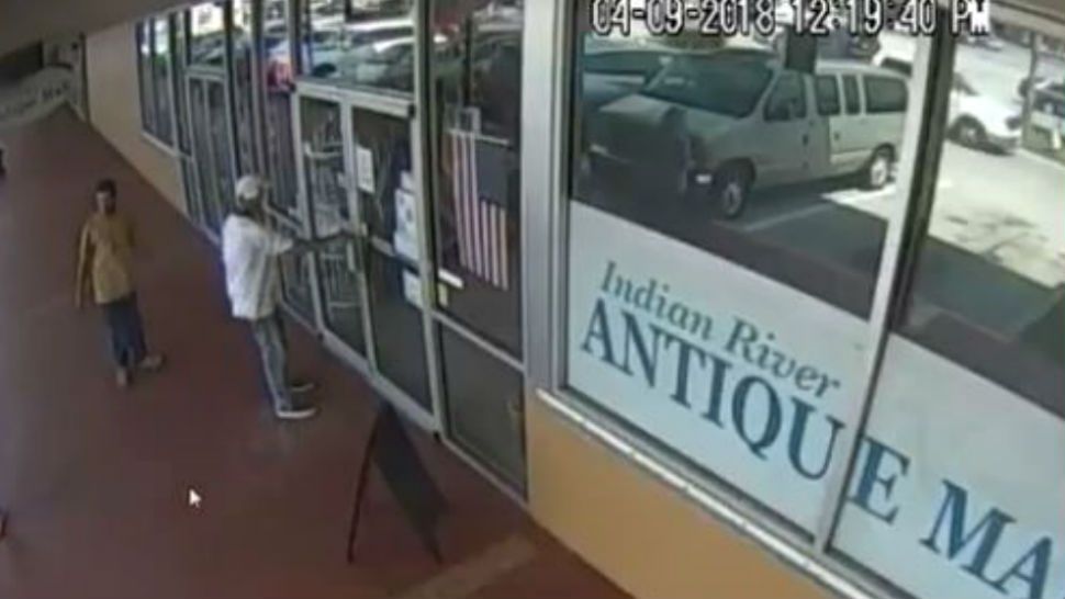 Two men seen entering the Indian River Antique Mall are accused of stealing $2,000 worth of artwork. (Melbourne Police)