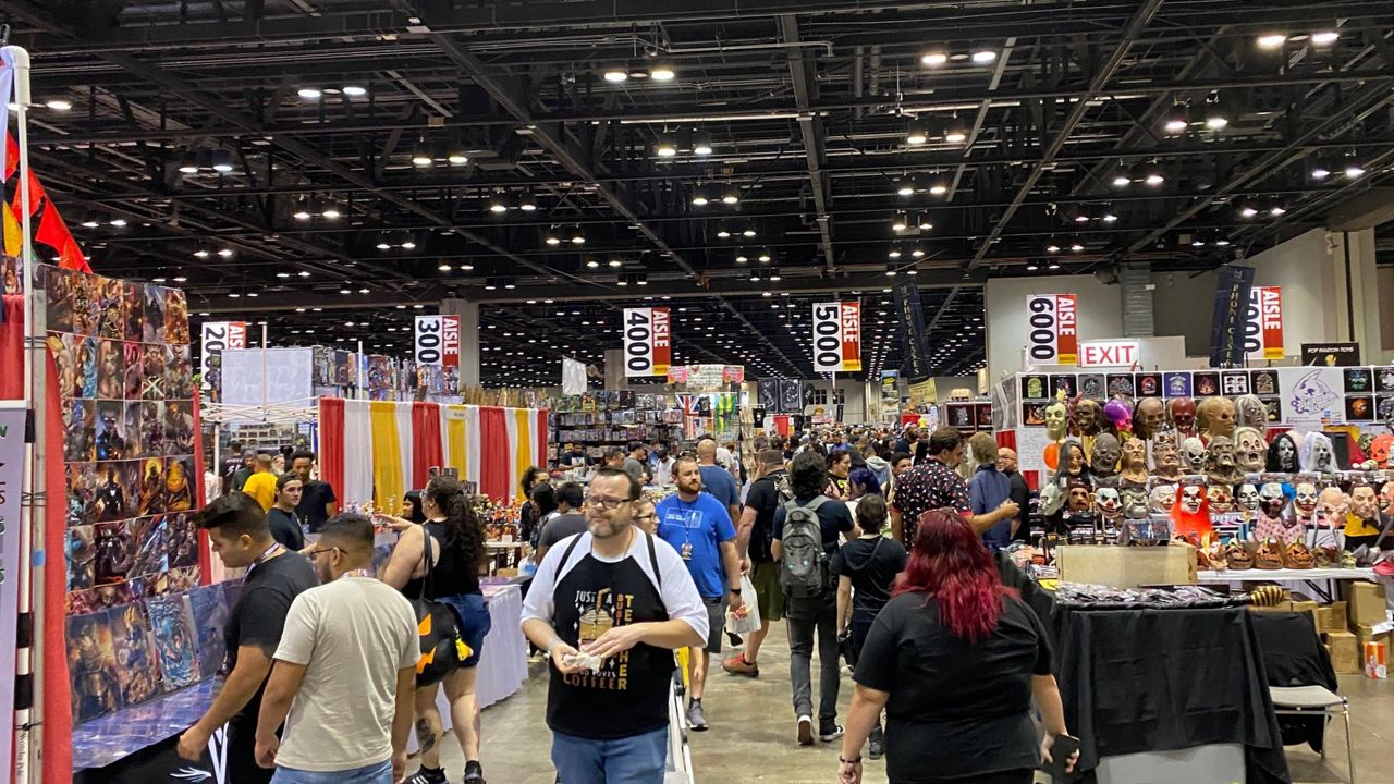 Fans on the show floor of MegaCon Orlando 2022 at the Orange County Convention Center. (Spectrum News/Ashley Carter)