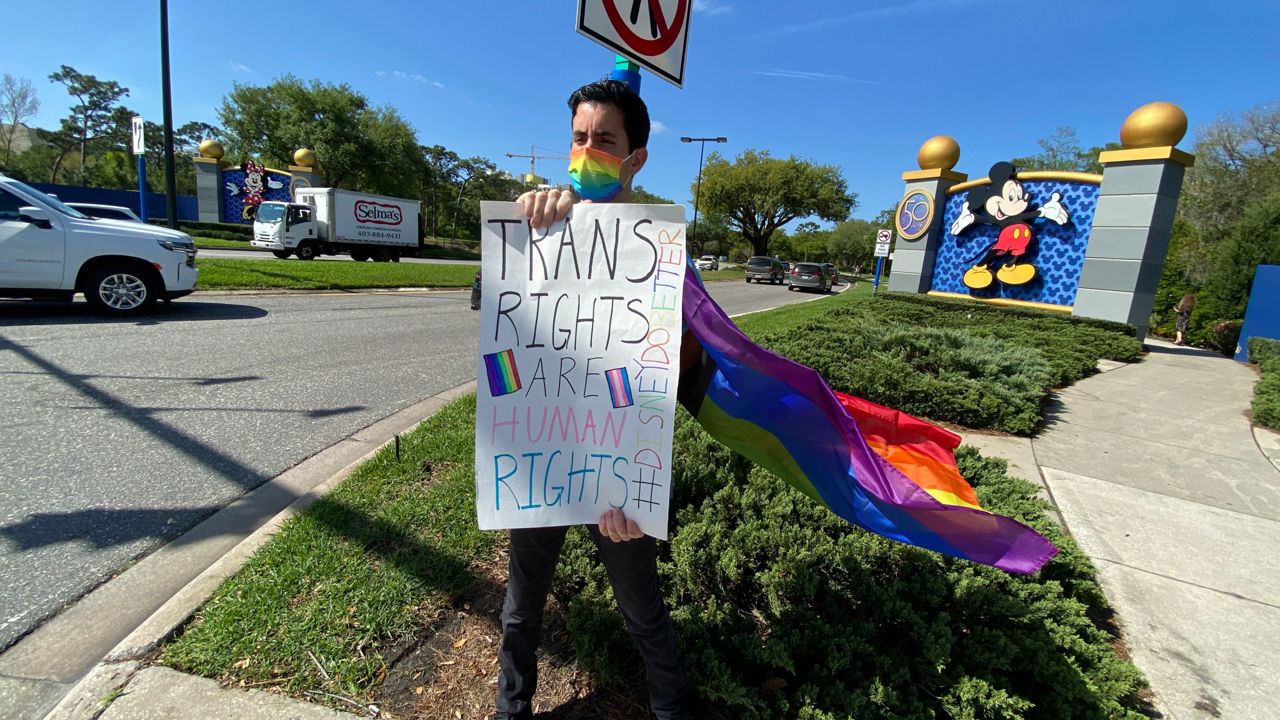 Nicholas Maldonado, a Disney employee, participated in a walkout Tuesday to protest the company's response Florida's so-called "Don't Say Gay" bill. (Spectrum News 13)