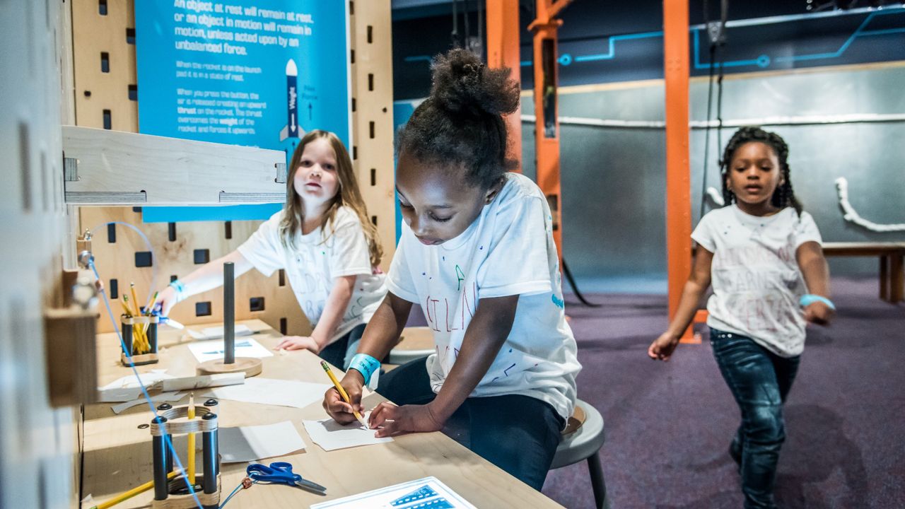 Children participating in activities at the Orlando Science Museum's Kinetic Zone. (Photo: Orlando Science Center)