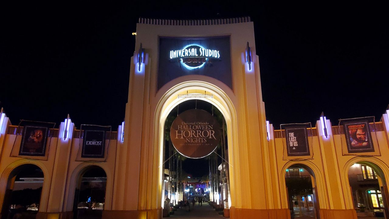 Halloween Horror Nights banners up at the entrance to Universal Studios Florida. (Spectrum News/Ashley Carter)