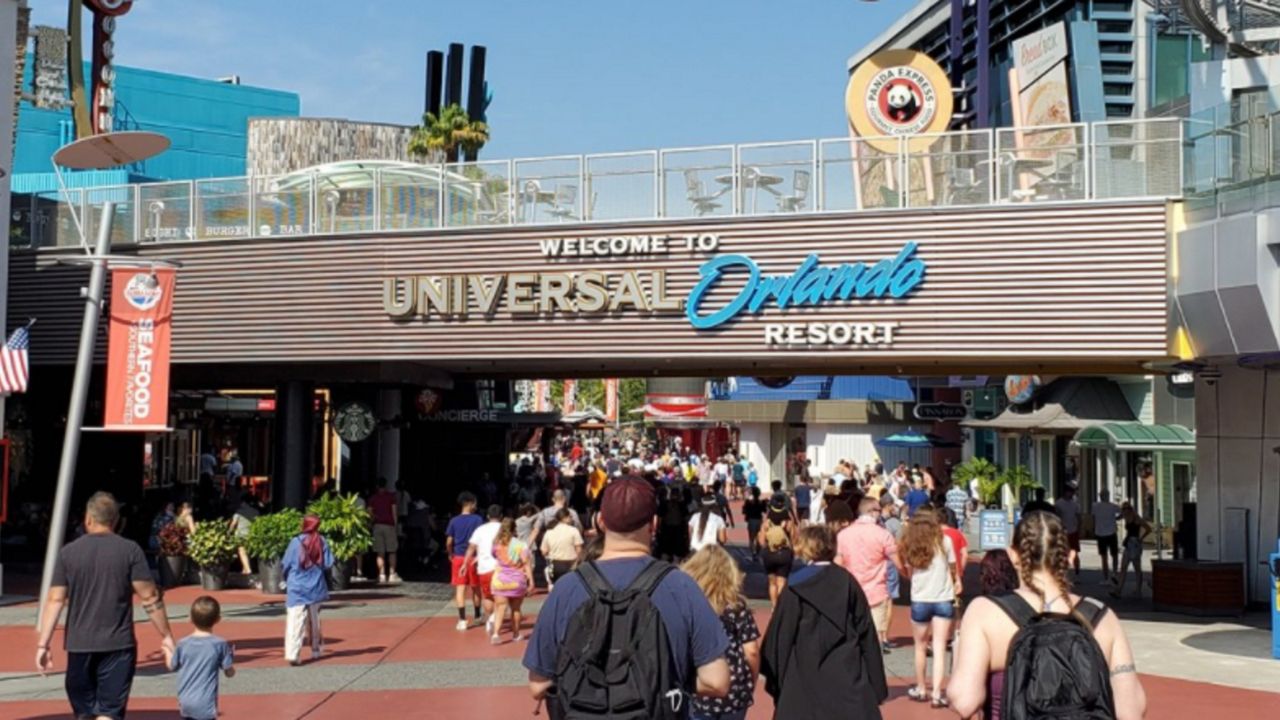 Guests walking through Universal CityWalk at Universal Orlando Resort. (Spectrum News/Ashley Carter)