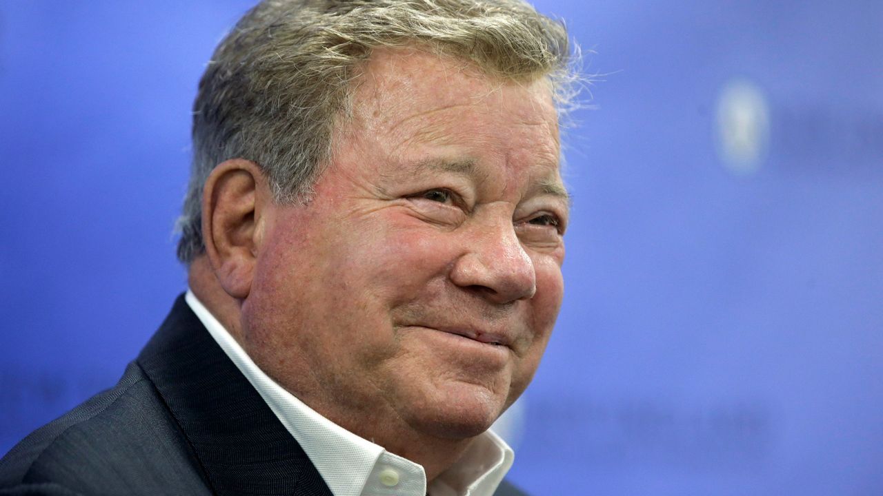 Actor William Shatner smiles while taking questions from reporters, Sunday, May 6, 2018, after delivering the commencement address at New England Institute of Technology graduation ceremonies, in Providence, R.I. (AP Photo/Steven Senne)