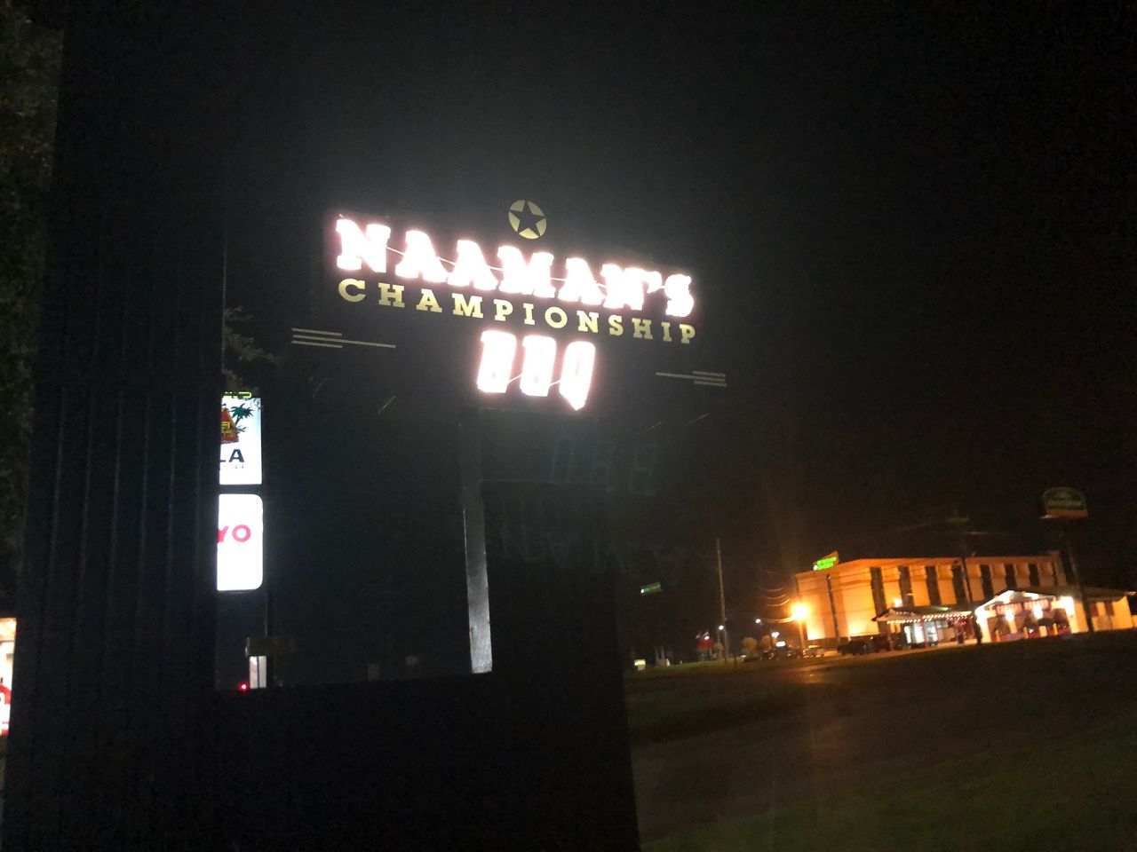 This photo shows a neon sign at Naaman's. (Bryan Boes/Spectrum News)