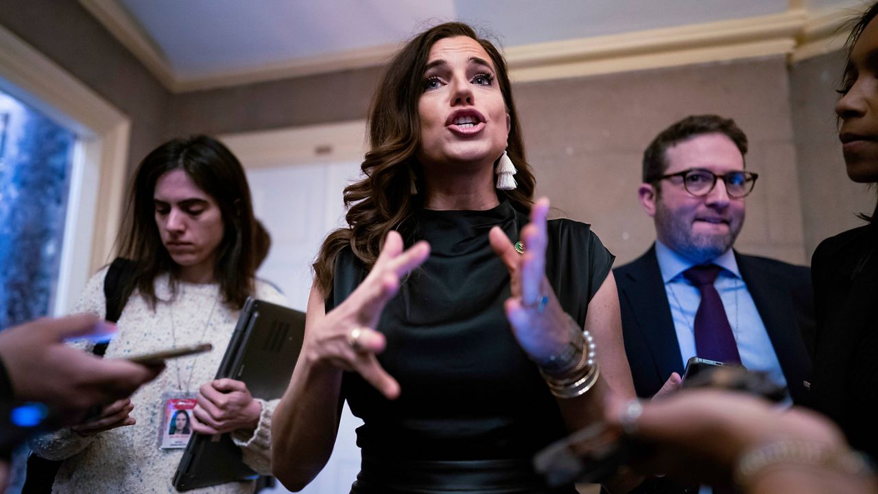 Rep. Nancy Mace, R-S.C., talks to reporters Thursday outside the office of Speaker of the House Kevin McCarthy, R-Calif., after she had openly opposed Republican efforts to kick Democratic Rep. lhan Omar from the House Foreign Affairs Committee. (AP Photo/J. Scott Applewhite)