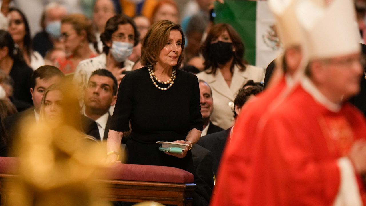 House Speaker Nancy Pelosi looks at Pope Francis on Wednesday as he celebrates Mass at St. Peter's Basilica at the Vatican. (AP Photo/Alessandra Tarantino)