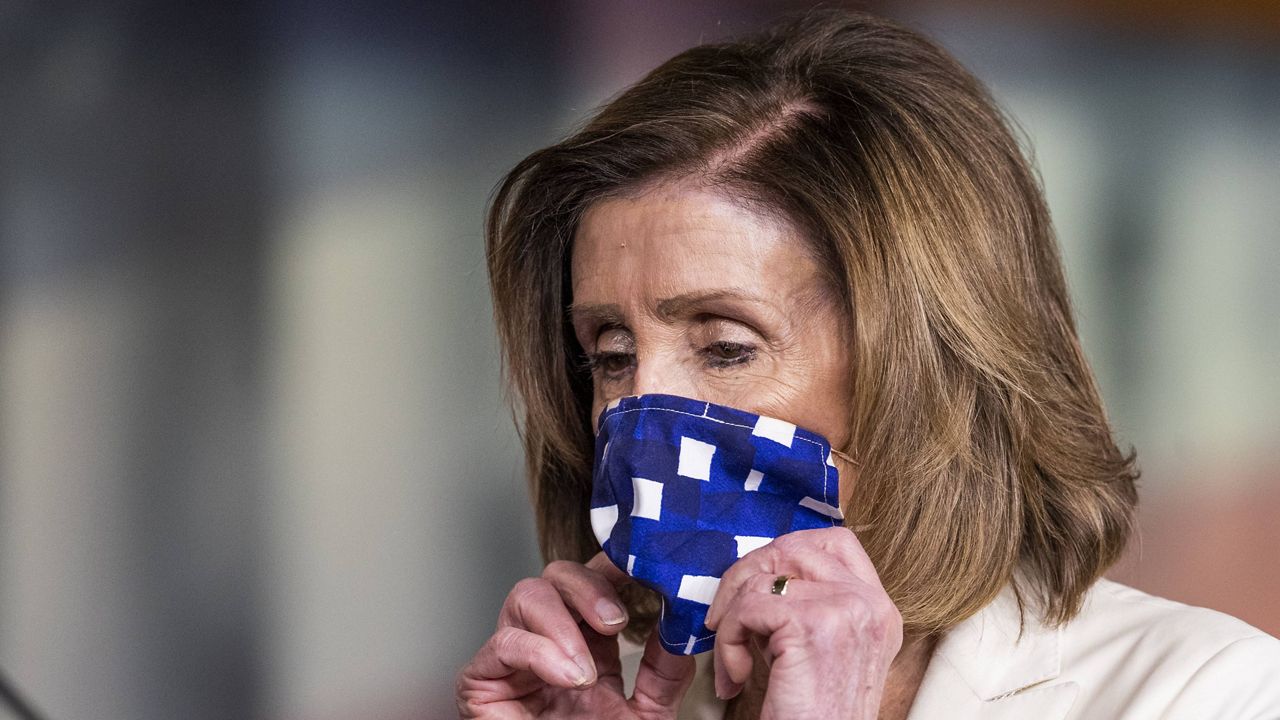 House Speaker Nancy Pelosi wears a mask on Capitol Hill. (AP Photo/Manuel Balce Ceneta, File)
