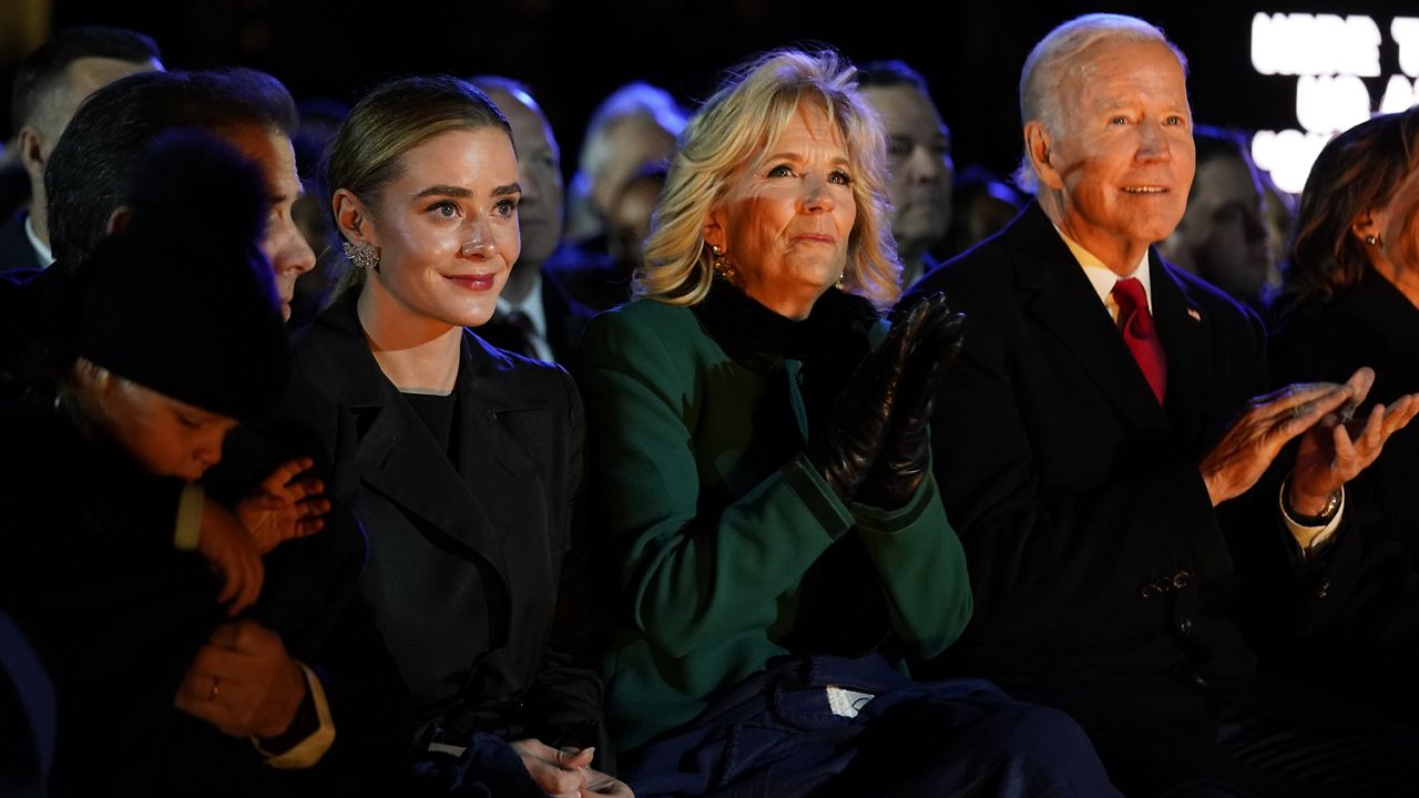 FILE - From left, Hunter Biden holding son Beau, President Joe Biden's granddaughter Naomi Biden, first lady Jill Biden and President Joe Biden attend the lighting of National Christmas Tree on the Ellipse of the White House in Washington, Wednesday, Nov. 30, 2022. (AP Photo/Andrew Harnik)