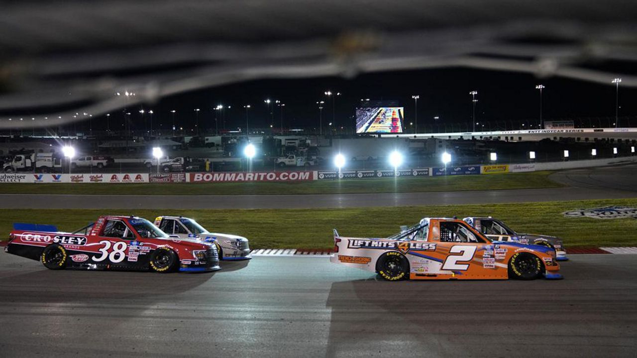 FILE - Sheldon Creed (2) races followed by Todd Gilliland (38) during a NASCAR truck series auto race at World Wide Technology Raceway Friday, Aug. 20, 2021, in Madison, Ill. (AP Photo/Jeff Roberson, File)