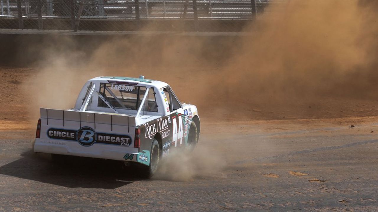 Kyle Larson spins out along the dirt track during NASCAR Truck Series practice, Friday, March 26, 2021, at Bristol Motor Speedway in Bristol, Tenn. (David Crigger/Bristol Herald Courier via AP)