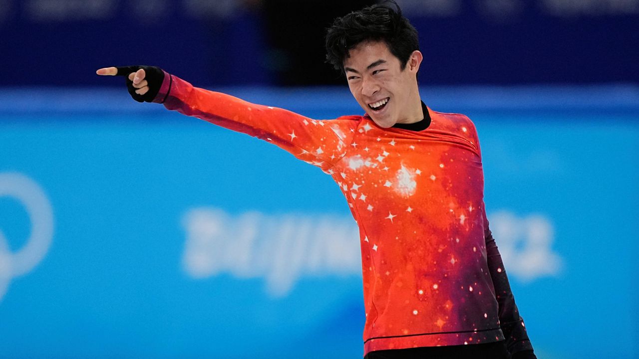 Nathan Chen competes in the men's free skate program Thursday at the Winter Olympics in Beijing. (AP Photo/David J. Phillip)
